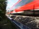Castioni pælemonterede kabelrender ARCO med passerende tog